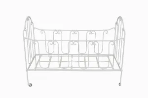 A vintage French folding wrought iron child's cot.