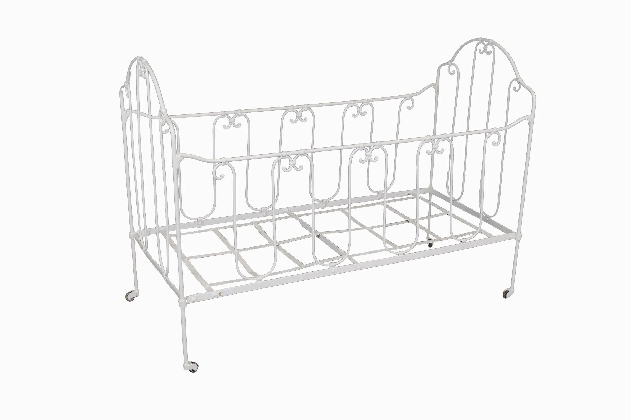 A vintage French folding wrought iron child's cot.