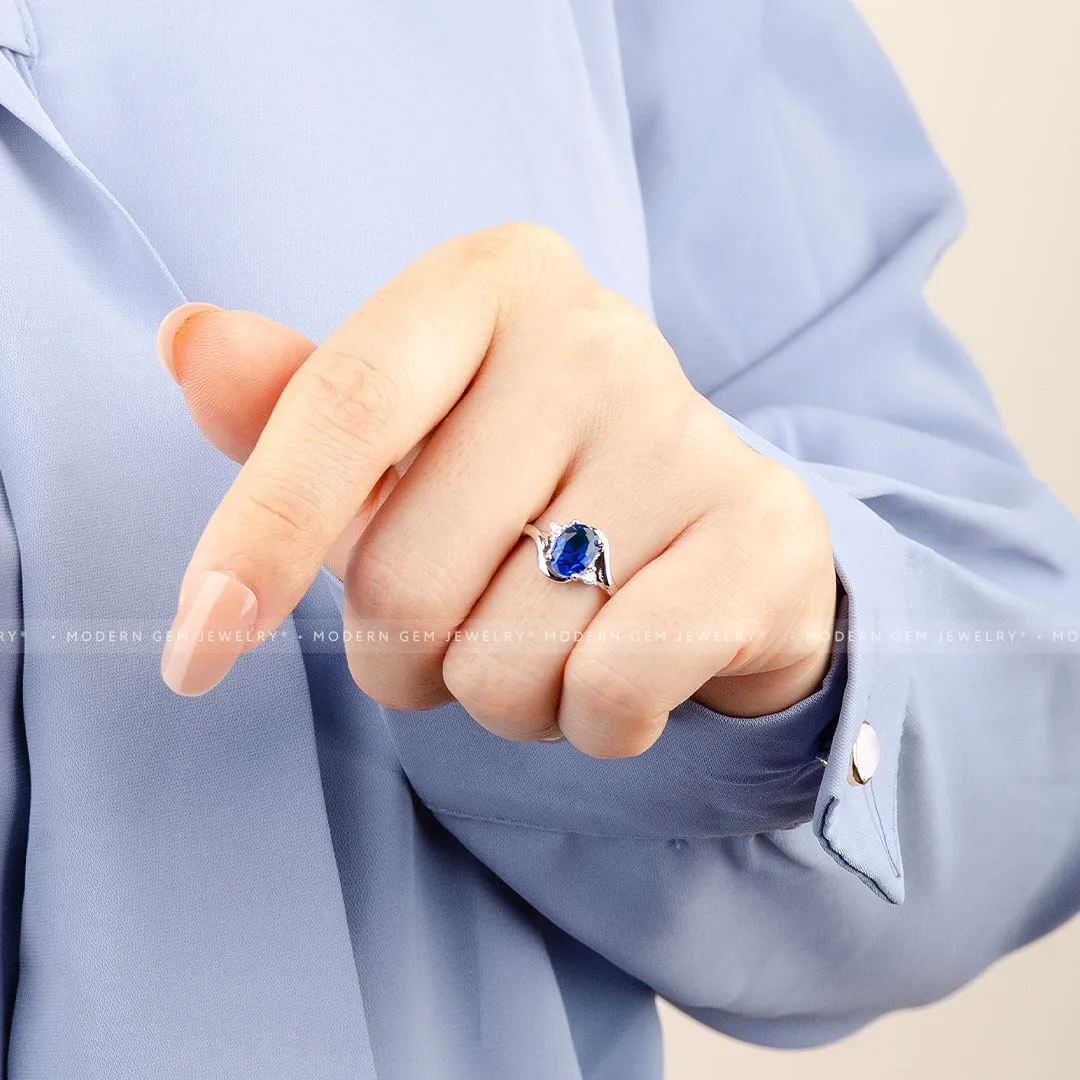 Blue Sapphire and Diamond Promise Ring Oval Twisted Shank