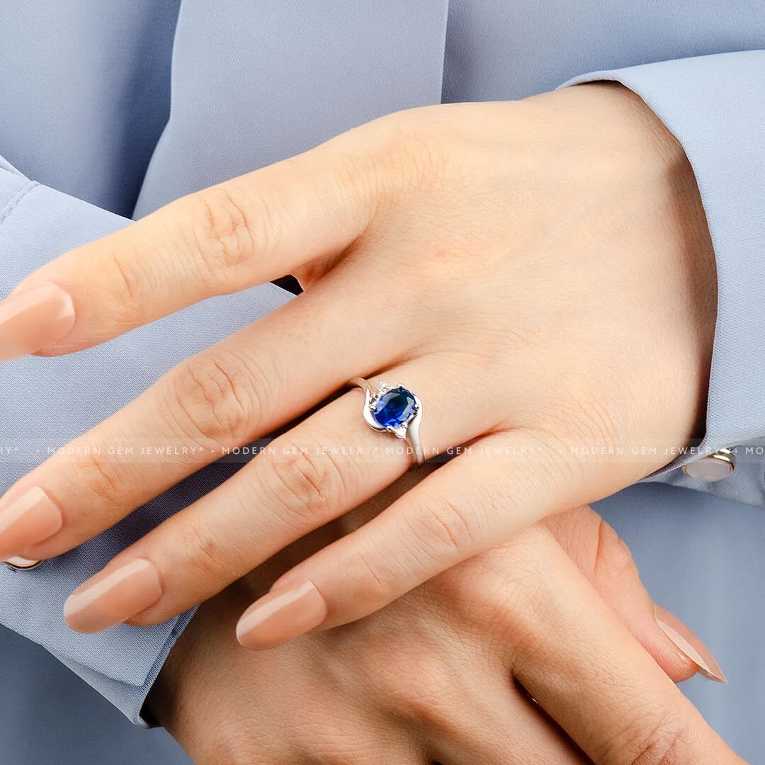 Blue Sapphire and Diamond Promise Ring Oval Twisted Shank