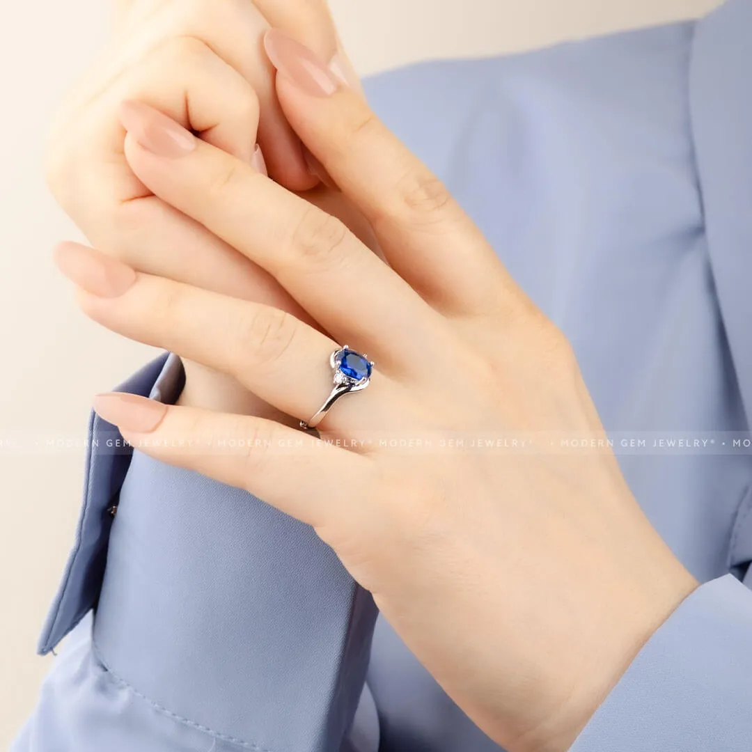 Blue Sapphire and Diamond Promise Ring Oval Twisted Shank