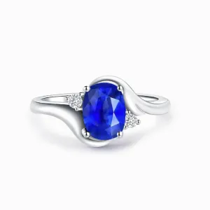 Blue Sapphire and Diamond Promise Ring Oval Twisted Shank