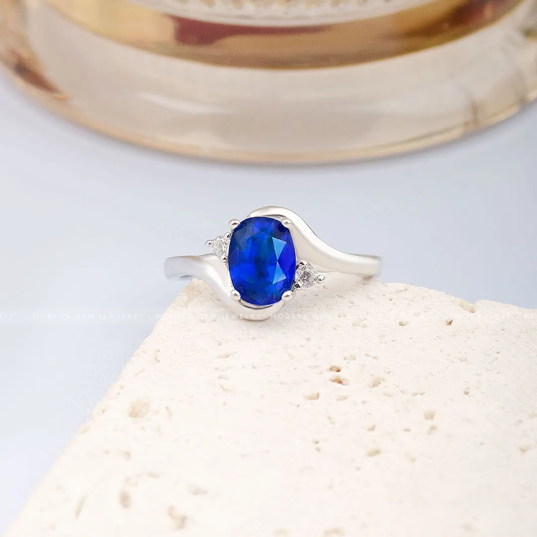 Blue Sapphire and Diamond Promise Ring Oval Twisted Shank