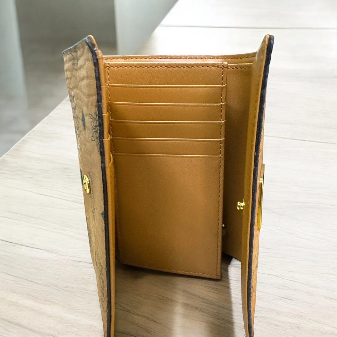 MCM Flip Leather wallet (H10 x L14 cm)