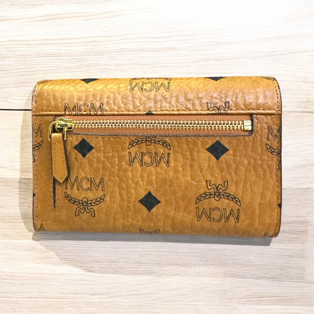 MCM Flip Leather wallet (H10 x L14 cm)