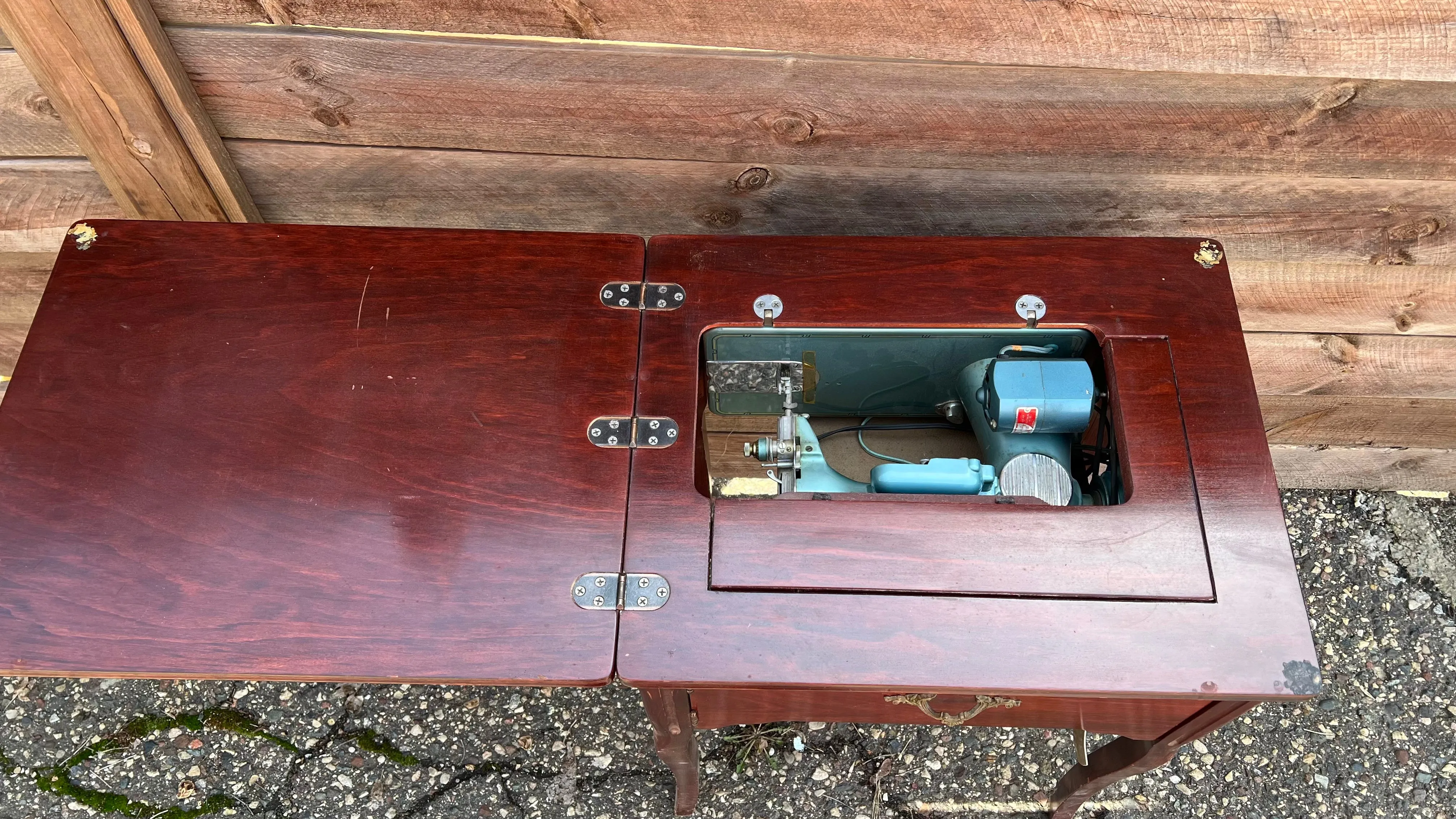 Sleek Modern Aqua Sewing Machine In Cabinet