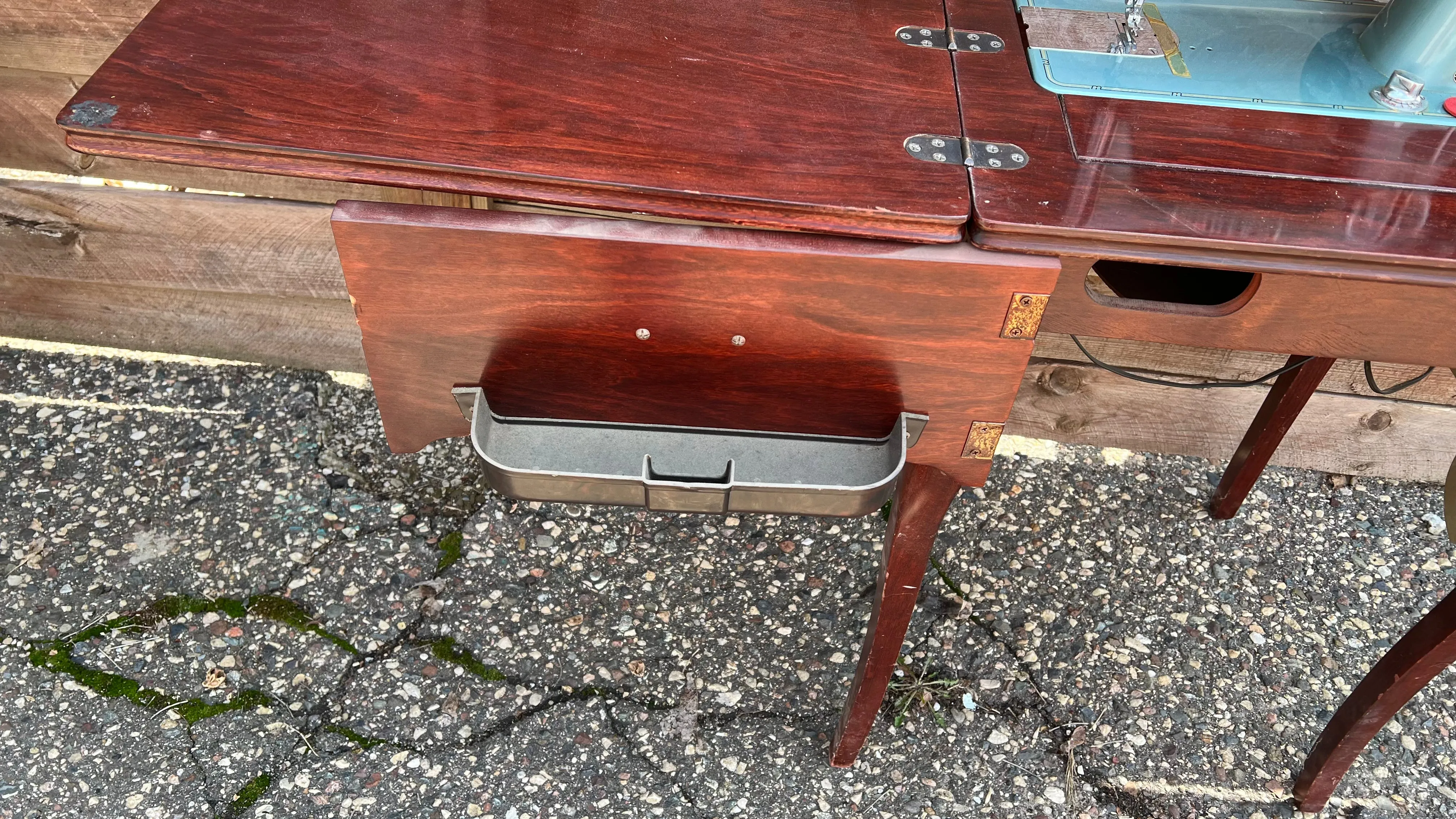 Sleek Modern Aqua Sewing Machine In Cabinet