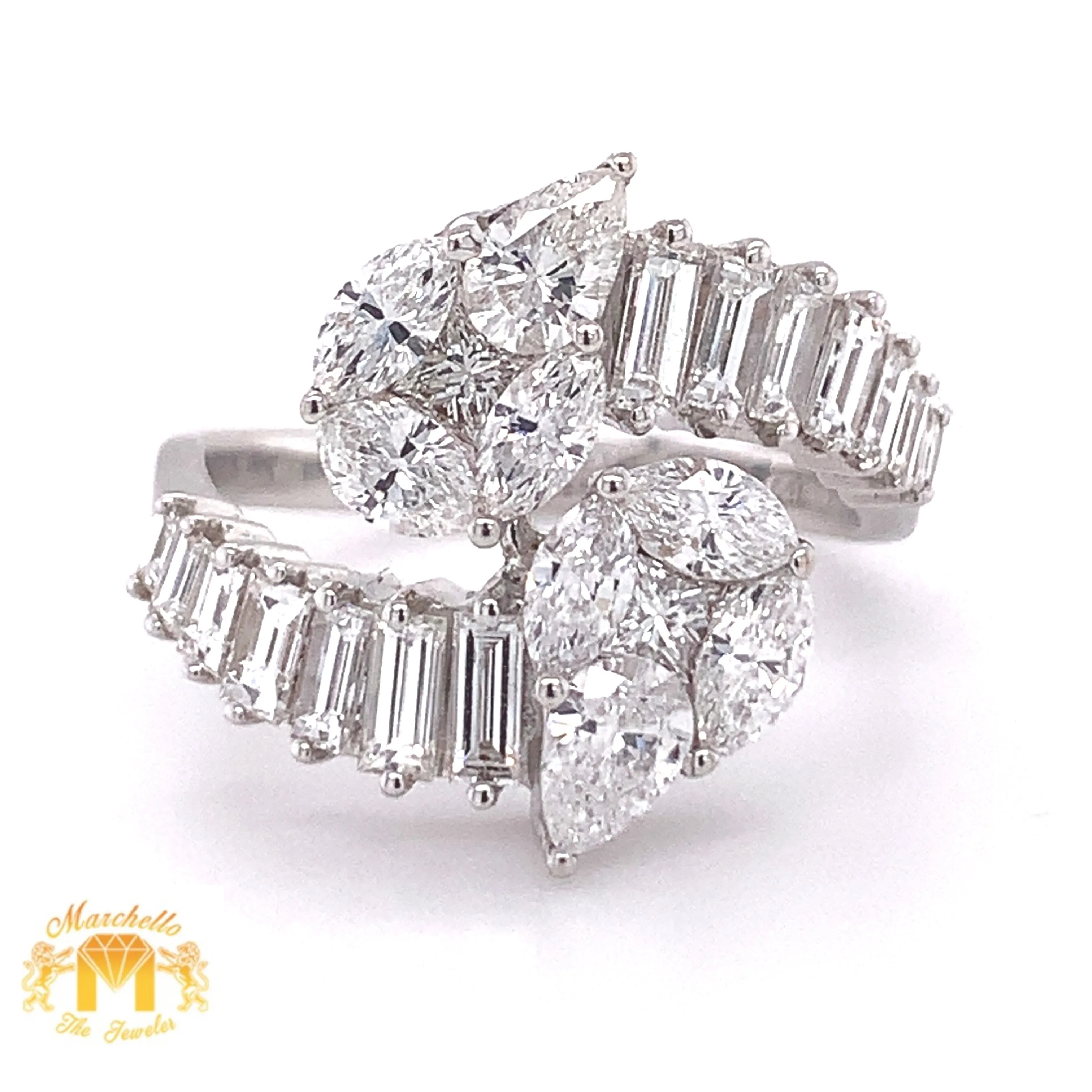 VVS/vs high clarity diamonds set in a 18k White Gold Pear-shaped Twin Ring (jumbo VVS baguettes)