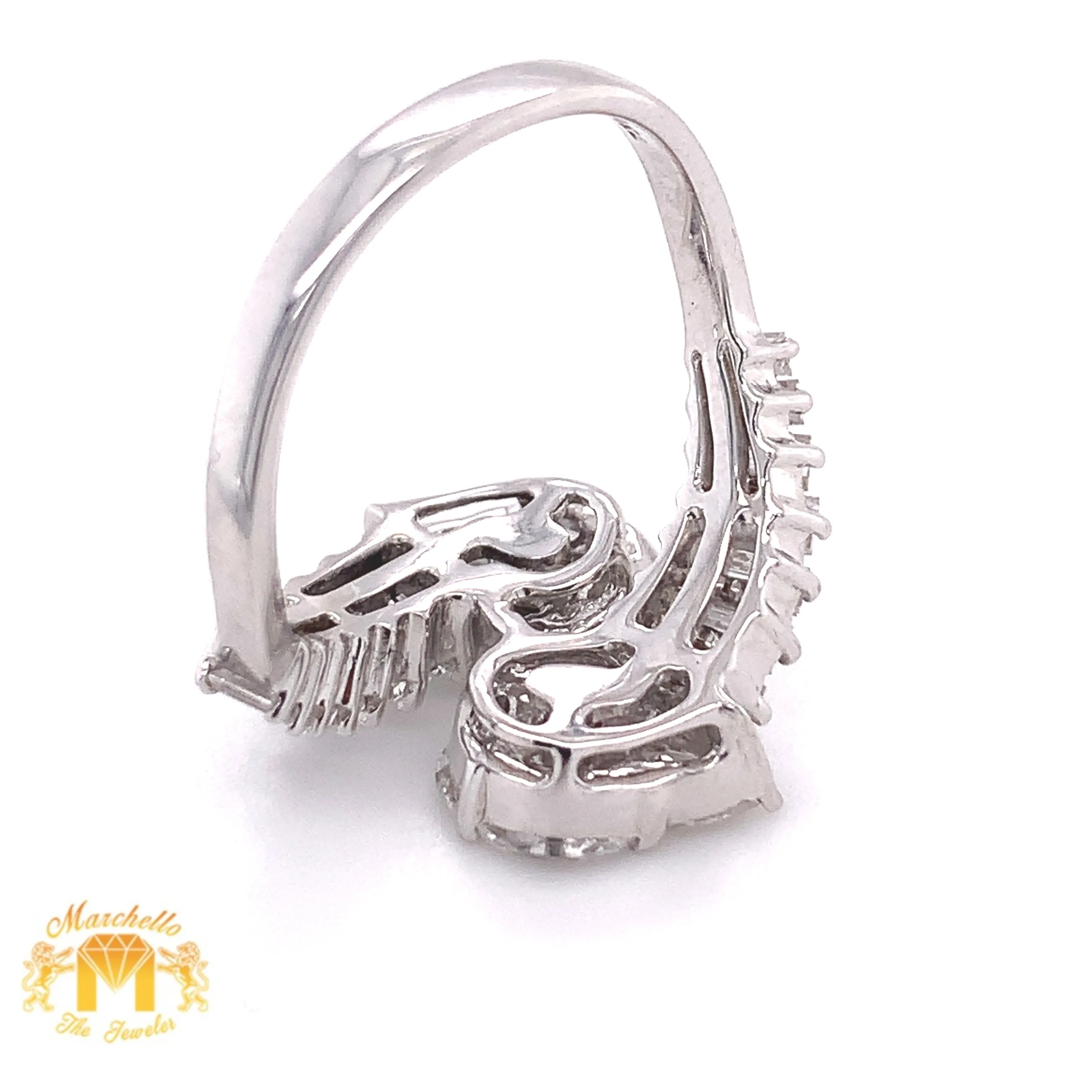 VVS/vs high clarity diamonds set in a 18k White Gold Pear-shaped Twin Ring (jumbo VVS baguettes)
